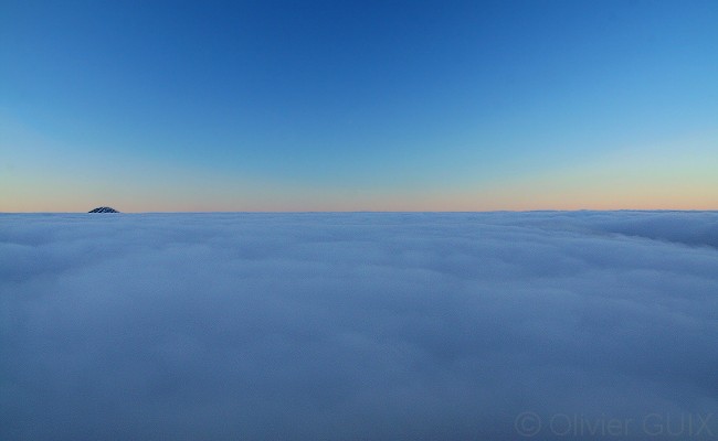 Olivier Guix - Photo Les Pyrnes en Hiver: Coucher de soleil, mer de nuages